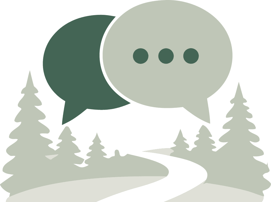 Winding road surrounded by trees, with a speech bubble in the middle